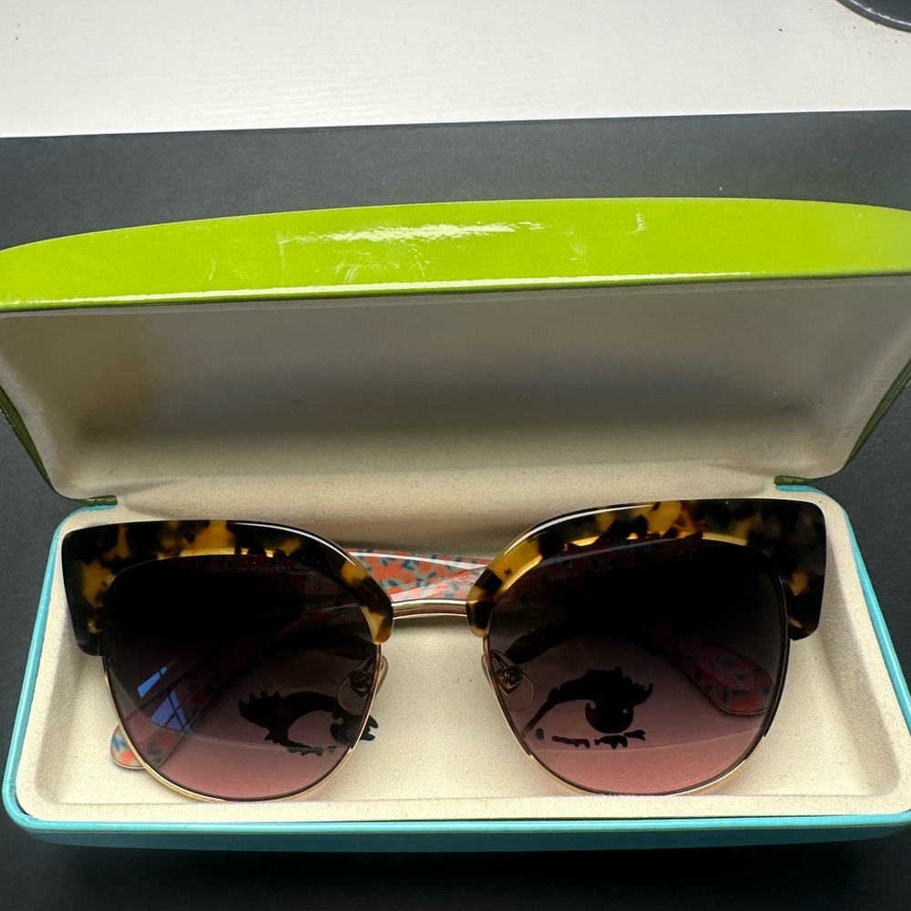 Authentic Kate Spade New York sunglasses. Comes with case